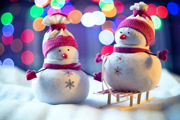 Two snowmen with a sled — Stock Photo, Image