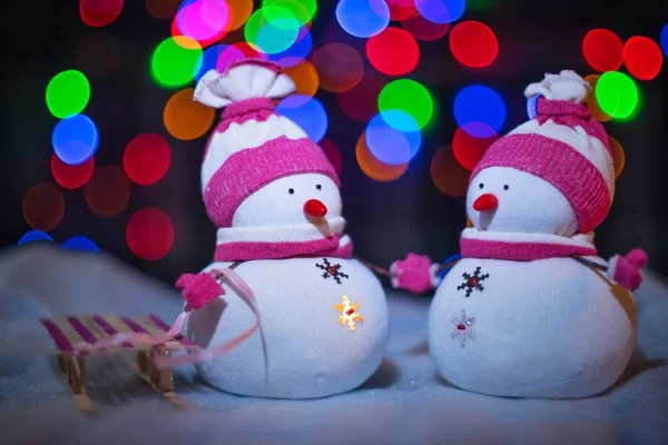 Two snowmen with a sled — Stock Photo, Image