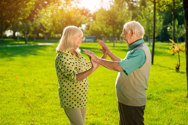 Senior woman and man outdoor. — Stock Photo, Image