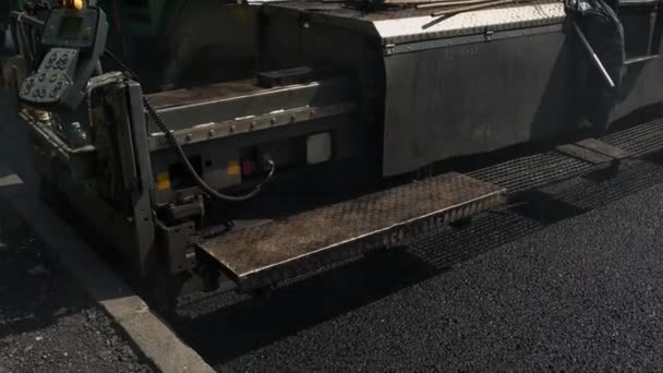 Svart asfalt yta. — Stockvideo