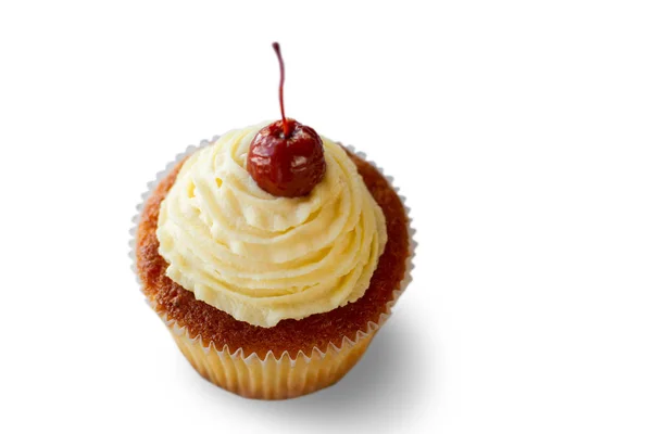 Cupcake com uma cereja . — Fotografia de Stock