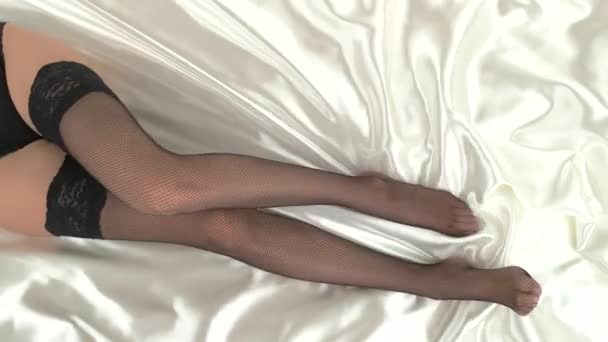 Legs wearing stockings with lace. — Stock Video
