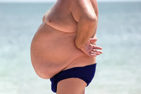 terciopelo Dime estimular Hombre gordo playa fotos de stock, imágenes de Hombre gordo playa sin  royalties | Depositphotos