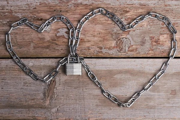 Chain hearts with lock.