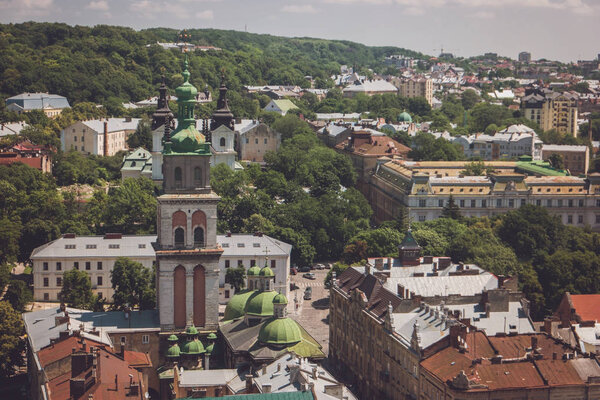 Town and green trees.