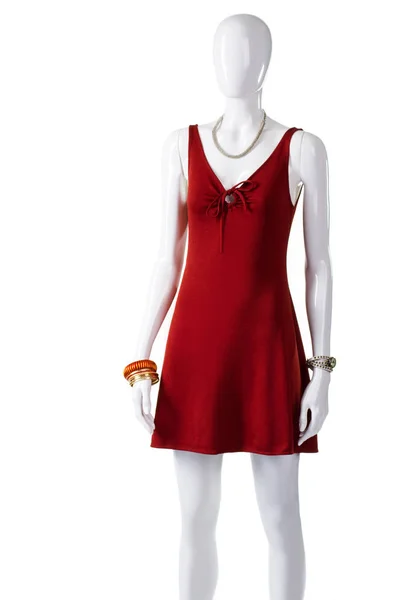 Red keyhole dress on mannequin.