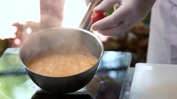 Saucepan with hot liquid. — Stock Video