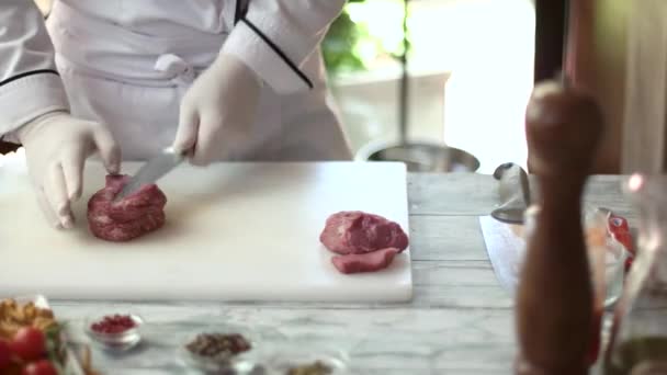 Chef and meat on board. — Stock Video