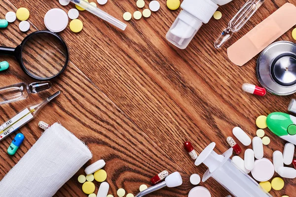 Medicines and tools on wood.