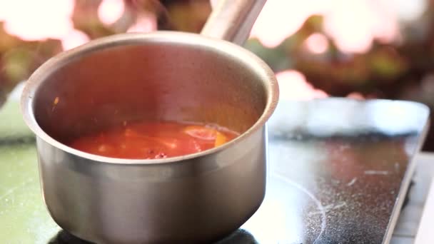 Sauce boiling in slow-mo. — Stock Video