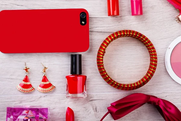 Cell phone, make-up, accessories.