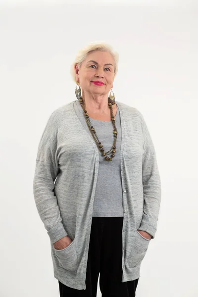 Elderly woman standing isolated. — Stock Photo, Image