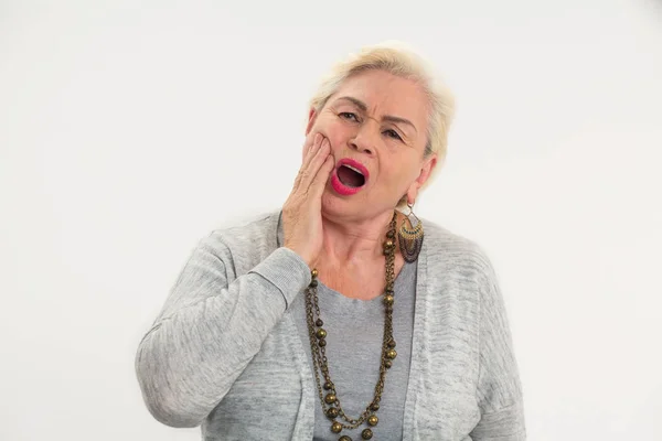 Elderly woman having toothache isolated. — Stock Photo, Image