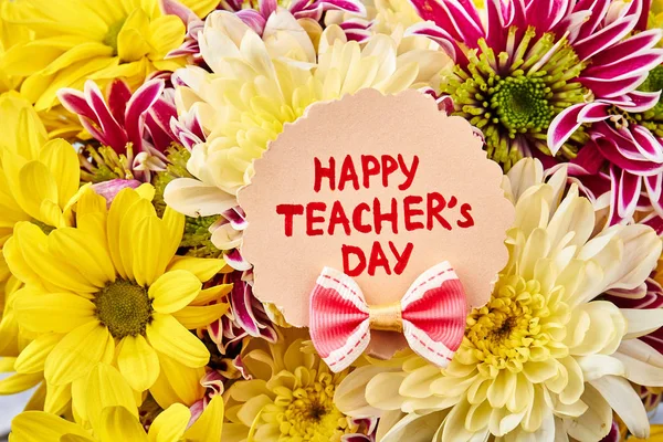 Flowers and Teachers Day Card. Congratulation with Knowledge Day.