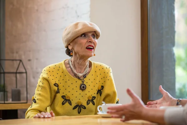 Old lady in cafe. — Stock Photo, Image