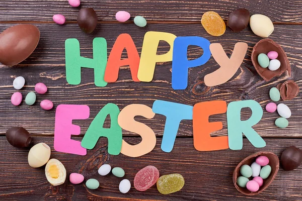 Mutlu Paskalya yazı ve tatlılar. — Stok fotoğraf
