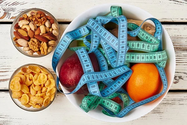 Fruits, cornflakes and nuts. — Stock Photo, Image