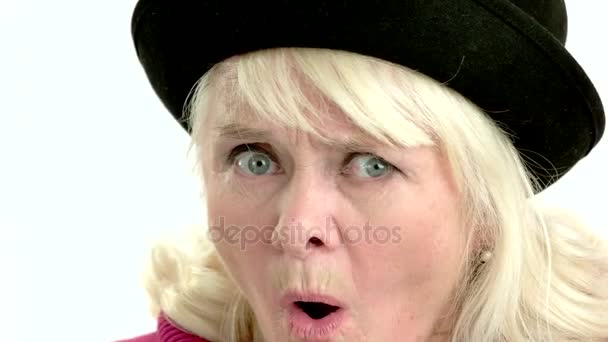 Surprised face of senior woman. — Stock Video