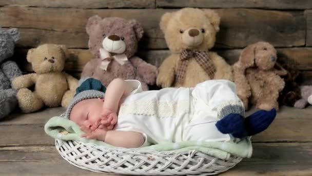 Sleeping baby and teddybears. — Stock Video