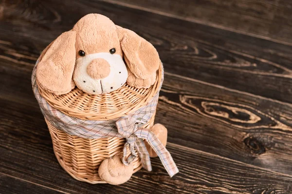 Willow basket with soft toy. — Stock Photo, Image
