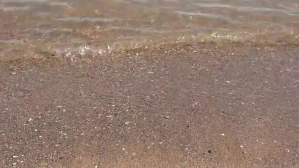Close-up of waves and sand. — Stock Video