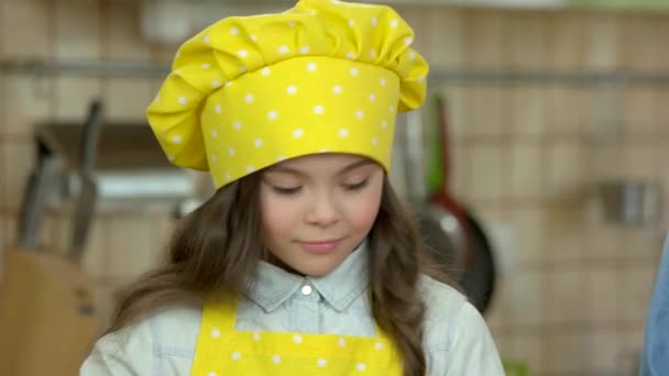 Little girl cooking. — Stock Video