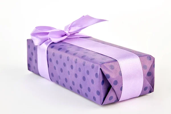 Present wrapped in purple box. — Stock Photo, Image