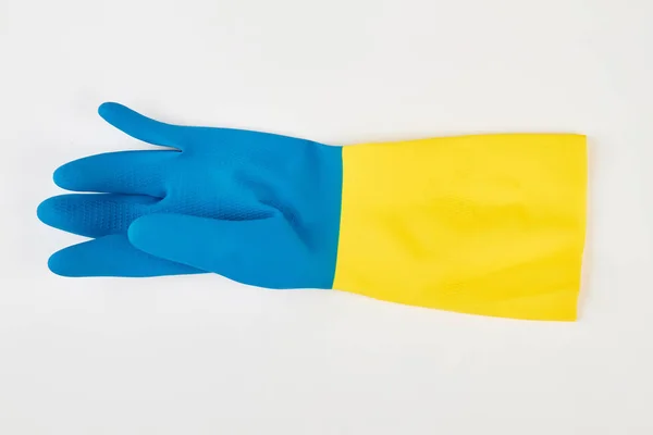 Жовта синя гумова рукавичка ізольована . — стокове фото