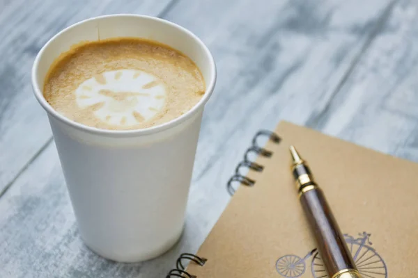 Coffee, notebook and pen. — Stock Photo, Image