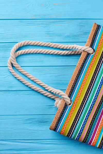 Cropped image of striped handbag. — Stock Photo, Image