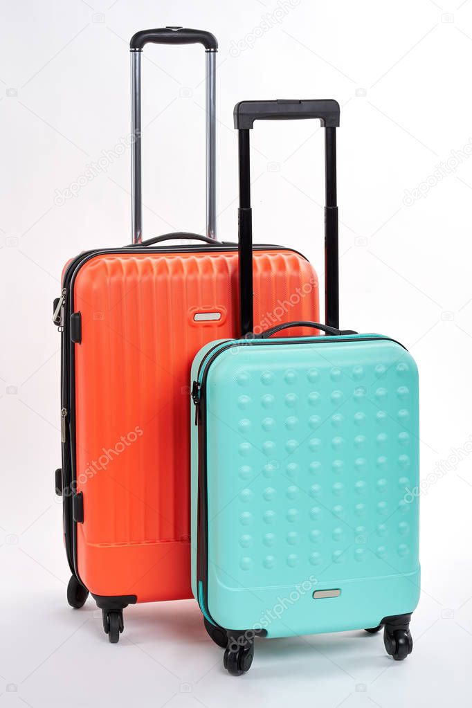 Suitcases with handles close up.