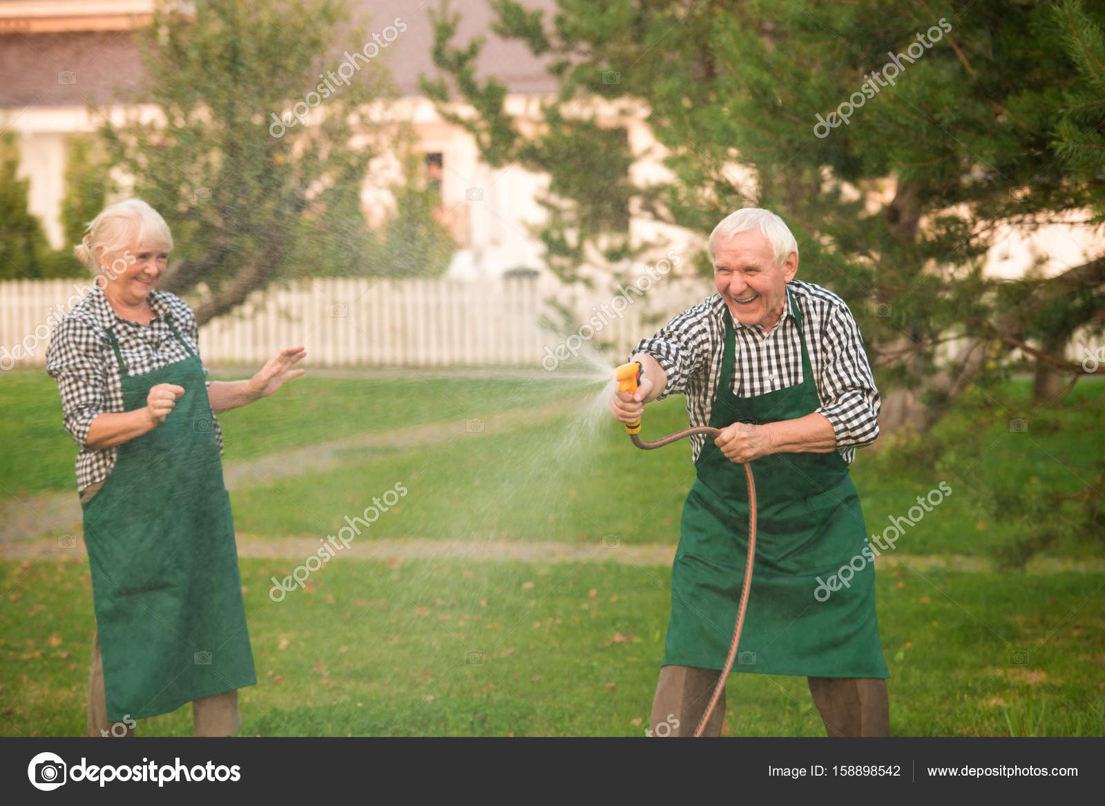 Elderly couple having fun. — Stock Photo © Denisfilm #158898542