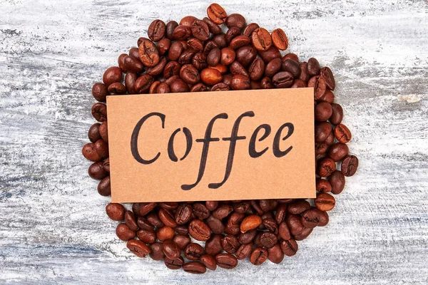 Grains de café et note . — Photo