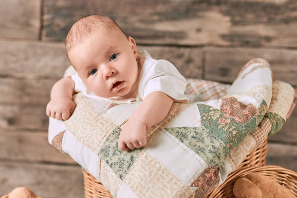 Small child with surprised face.