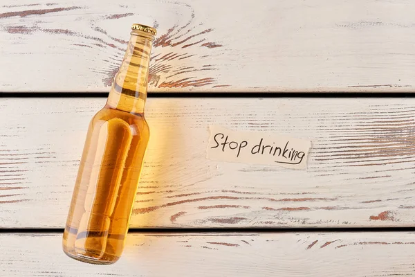 Drinking beer because of loneliness. — Stock Photo, Image