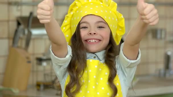 Happy girl in chef uniform. — Stock Video