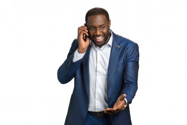 Başarılı gülümseyen iş adamı ile hareket eden telefon.