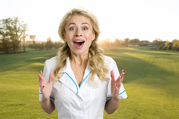 Excited beautiful young nurse outdoor. — Stock Photo, Image