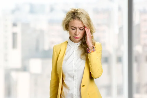Young business woman feeling headache. — Stock Photo, Image