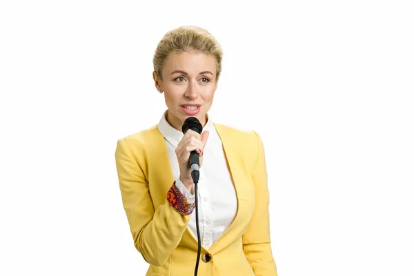 Giovane donna d'affari che parla al microfono . — Foto Stock