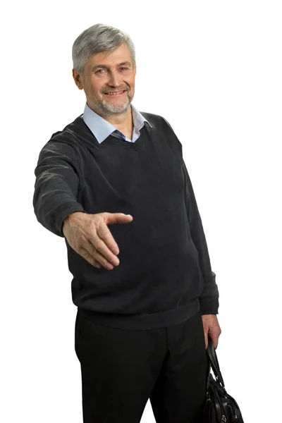 Smiling mature man with greeting gesture. — Stock Photo, Image