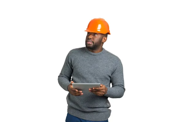 Serious architect holding computer tablet. — Stock Photo, Image