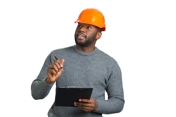 Young engineer inspecting construction. — Stock Photo, Image