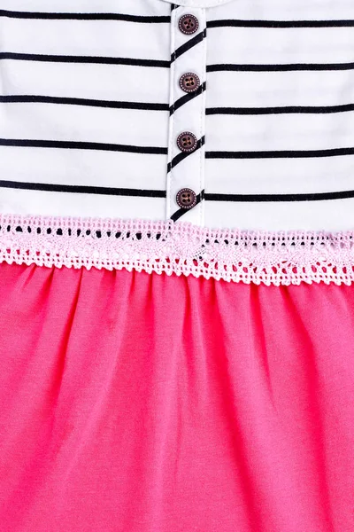 Detail of cotton baby dress.