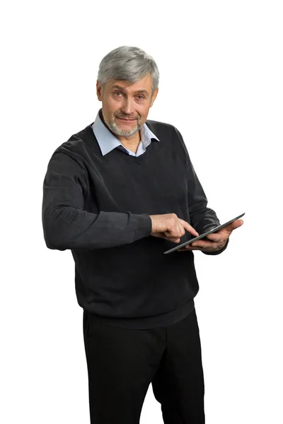 Mature man using computer tablet. — Stock Photo, Image