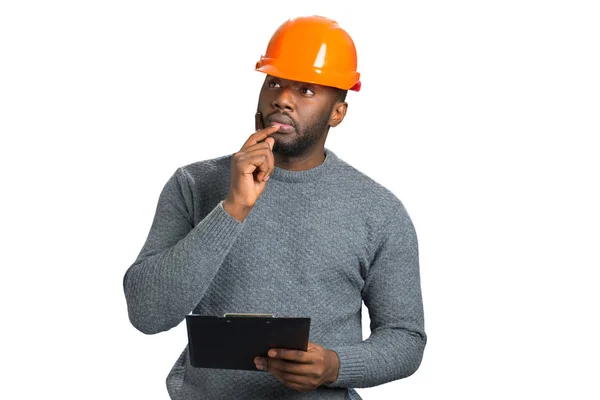 Thoughtful male architect with pen. — Stock Photo, Image