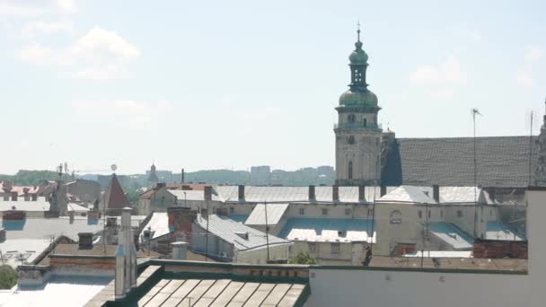 Church and town rooftops. — Stock Video