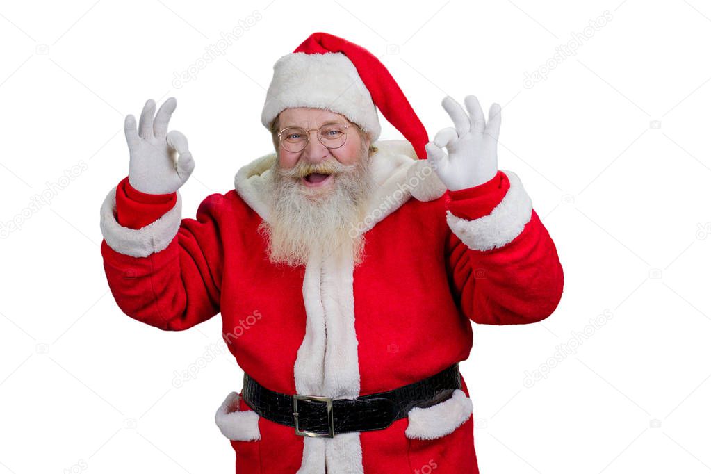 Santa showing ok sign, white background.