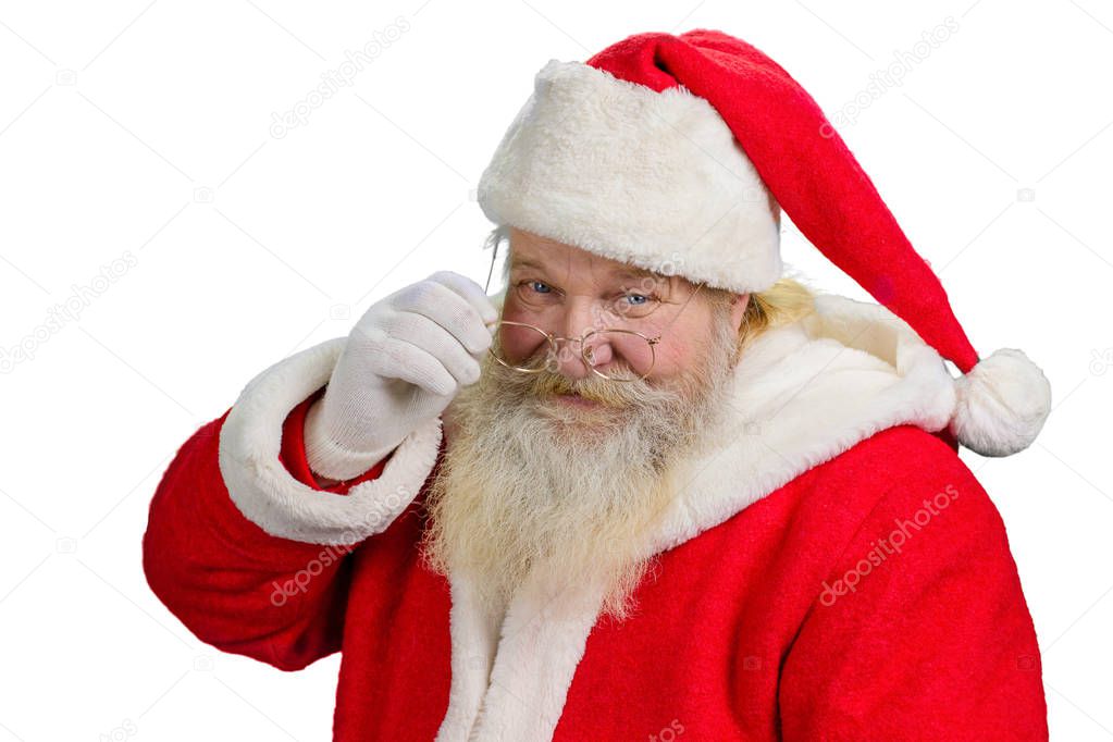 Santa Claus removing his glasses.