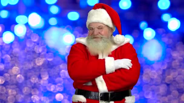 Santa Claus, pozadí rozmazané světla. — Stock video